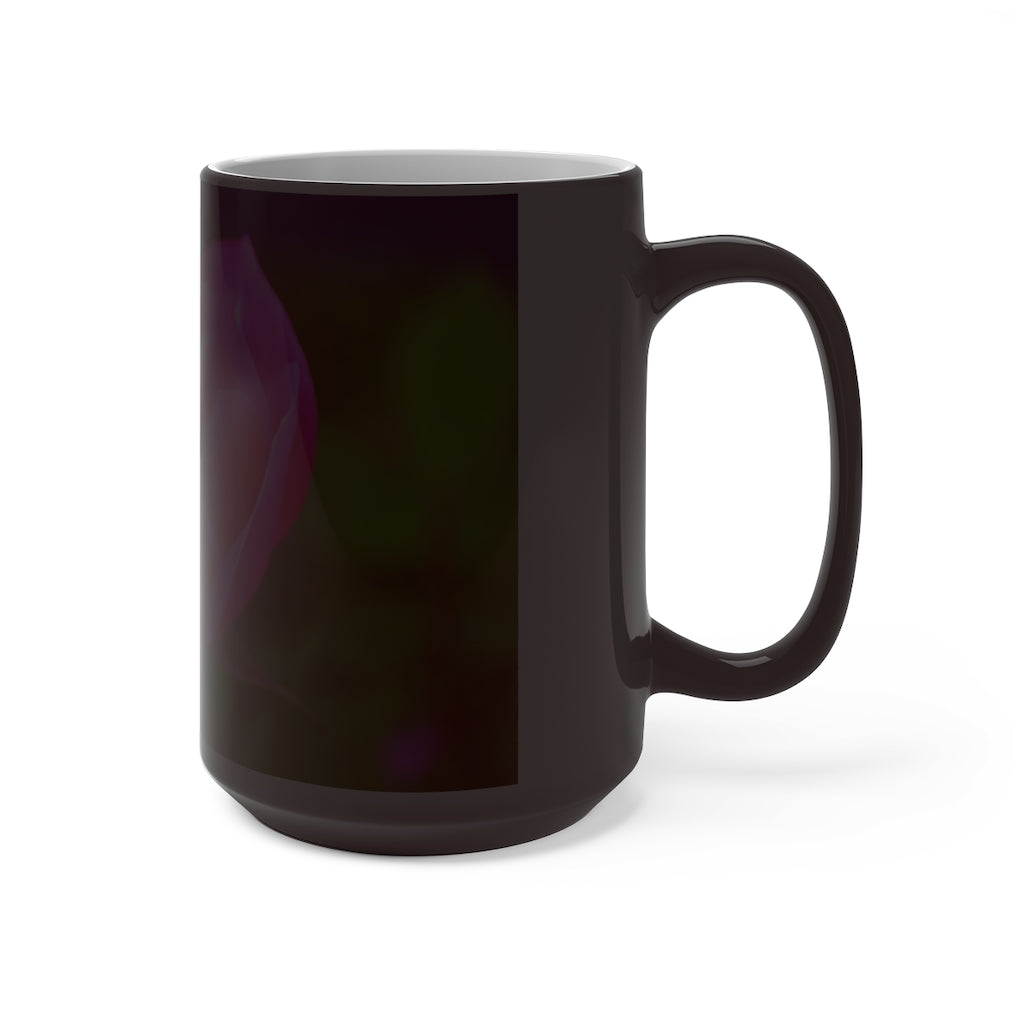 A pink flower color changing mug showcasing vibrant colors when filled with hot liquid, featuring a C-handle and rounded corners.
