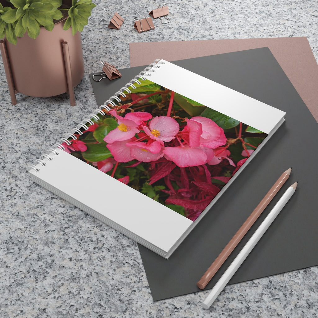 A stylish Pink Flowers Spiral Notebook featuring customizable covers and 128 wide-ruled pages, perfect for journaling and note-taking.