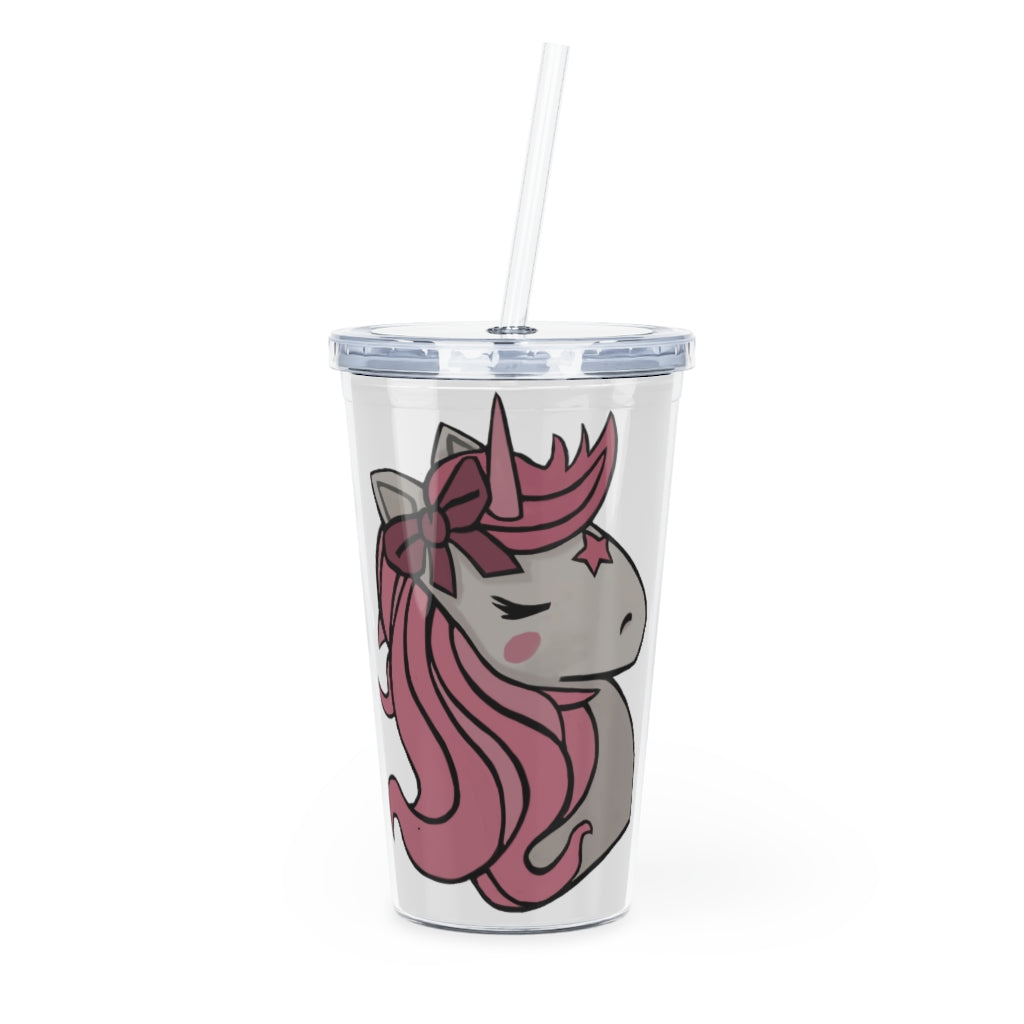 A vibrant pink plastic tumbler featuring a unicorn design, complete with a straw and lid, perfect for drinks at parties and events.