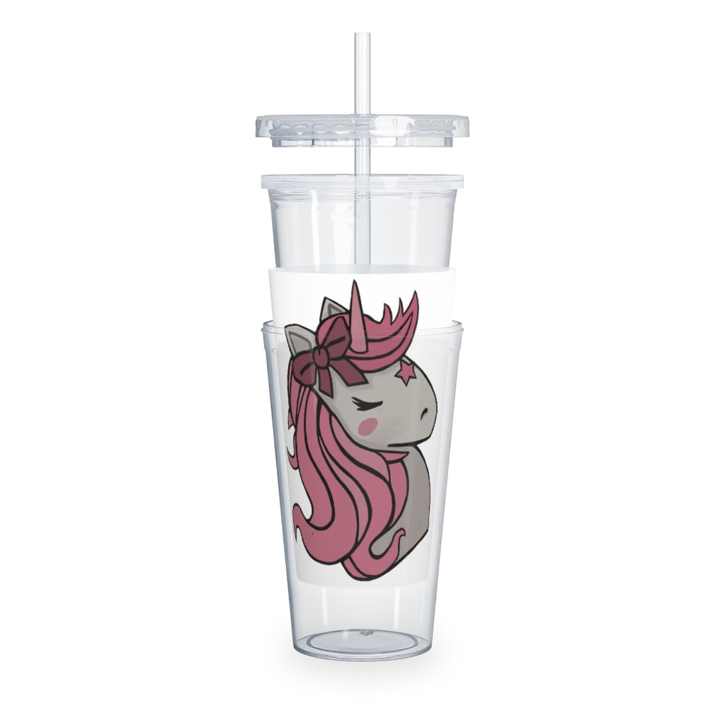 A vibrant pink plastic tumbler featuring a unicorn design, complete with a straw and lid, perfect for drinks at parties and events.