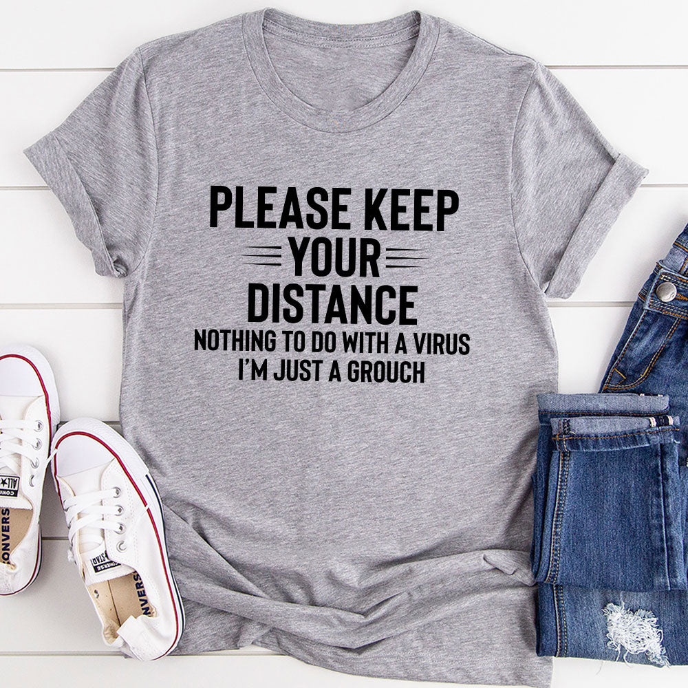 A stylish Please Keep Your Distance T-Shirt made from soft ring-spun cotton, featuring double stitching for durability.