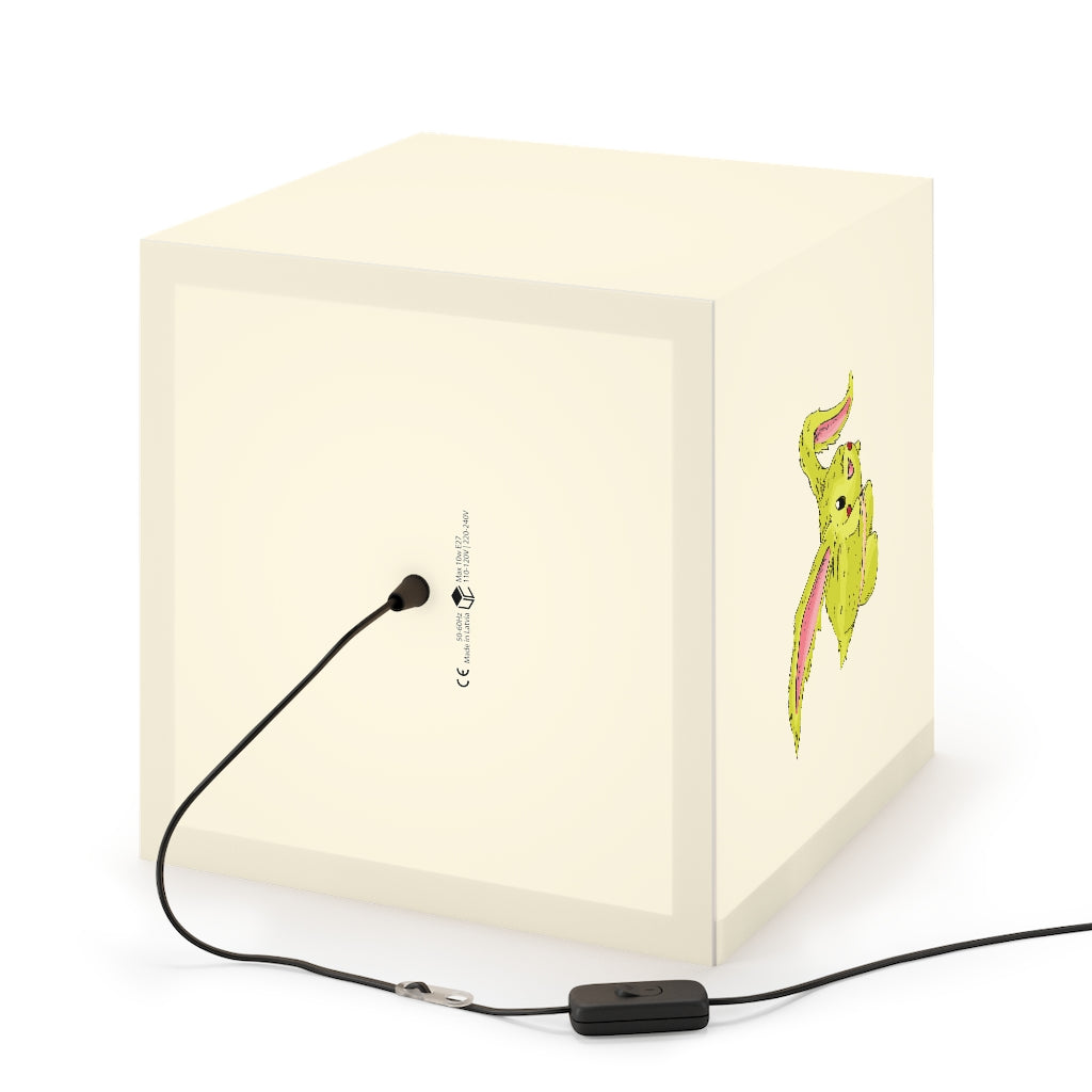 Pon-Pon Personalized Lamp in a stylish cube design, showcasing its unique customizable features and warm lighting.