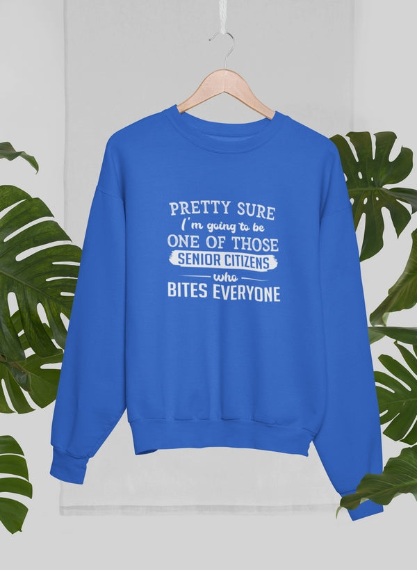 A comfortable and humorous tee shirt featuring the phrase 'Pretty Sure I'm Going To Be One Of Those Senior Citizens Who Bites', made from soft ring-spun cotton.