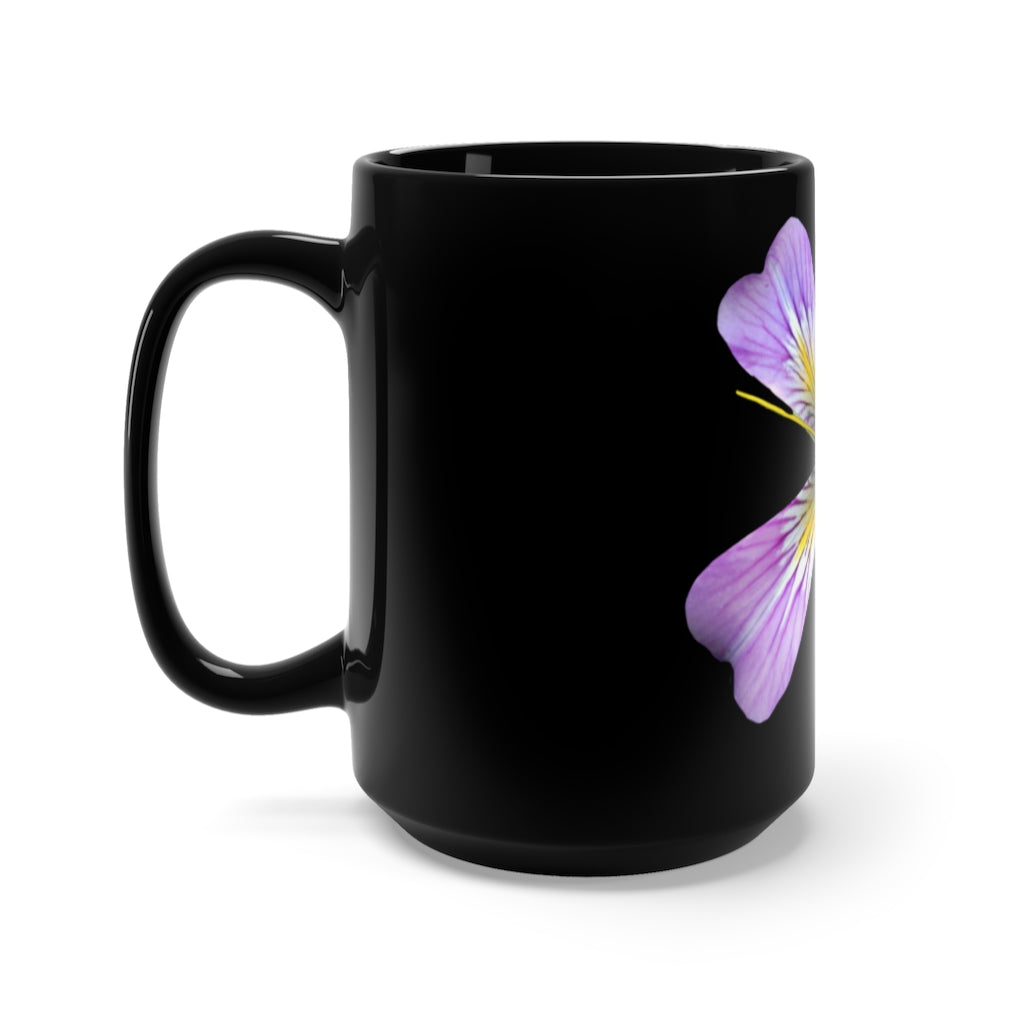 A stylish black ceramic mug featuring a vibrant purple flower design, perfect for coffee and tea lovers.
