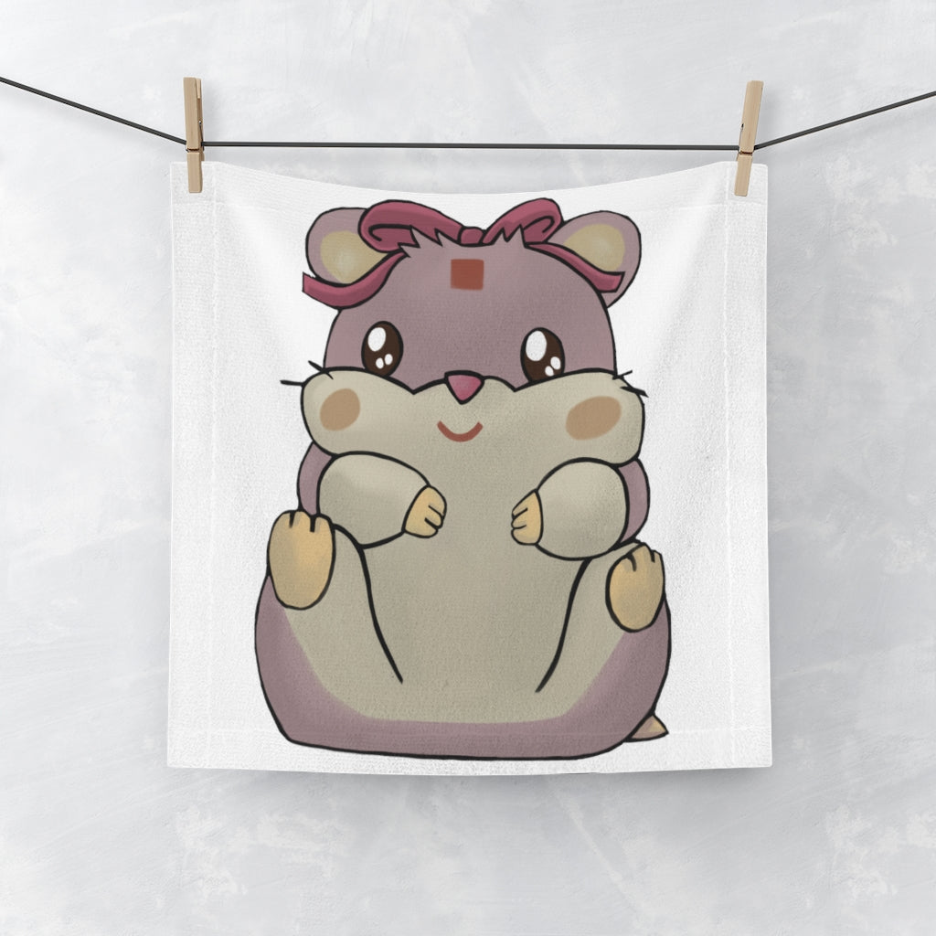 A vibrant purple face towel featuring a cute hamster design, made from a soft polyester blend on the front and absorbent cotton on the back.