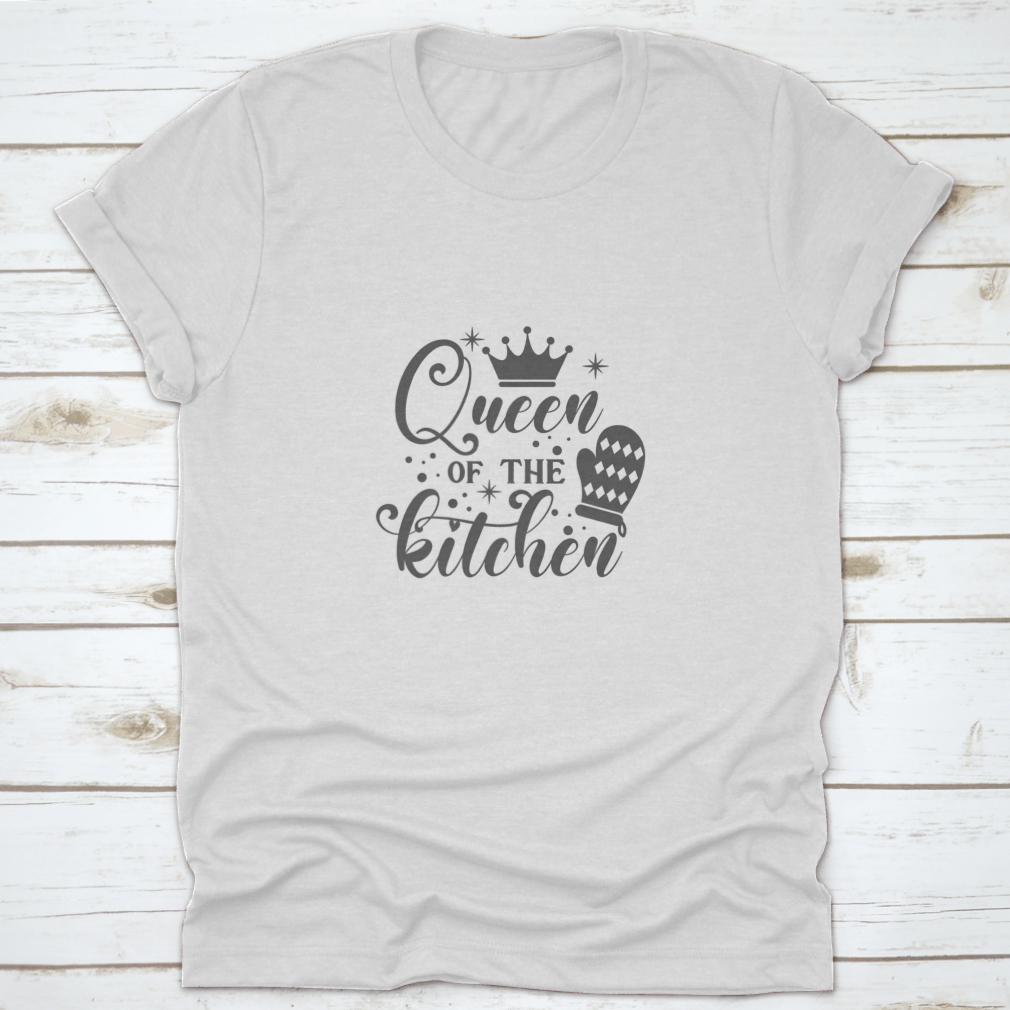 A stylish cotton t-shirt featuring the slogan 'Queen Of The Kitchen' in a fun vector design, perfect for cooking enthusiasts.