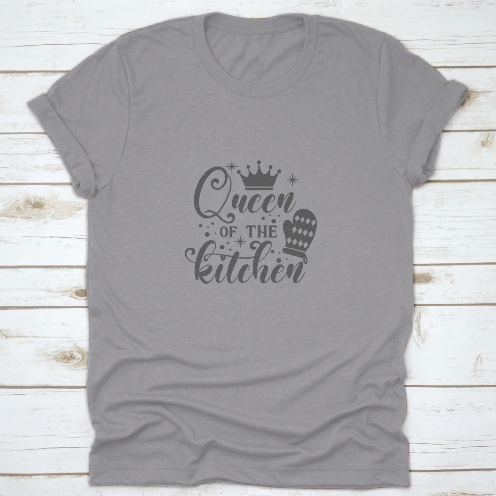 A stylish cotton t-shirt featuring the slogan 'Queen Of The Kitchen' in a fun vector design, perfect for cooking enthusiasts.