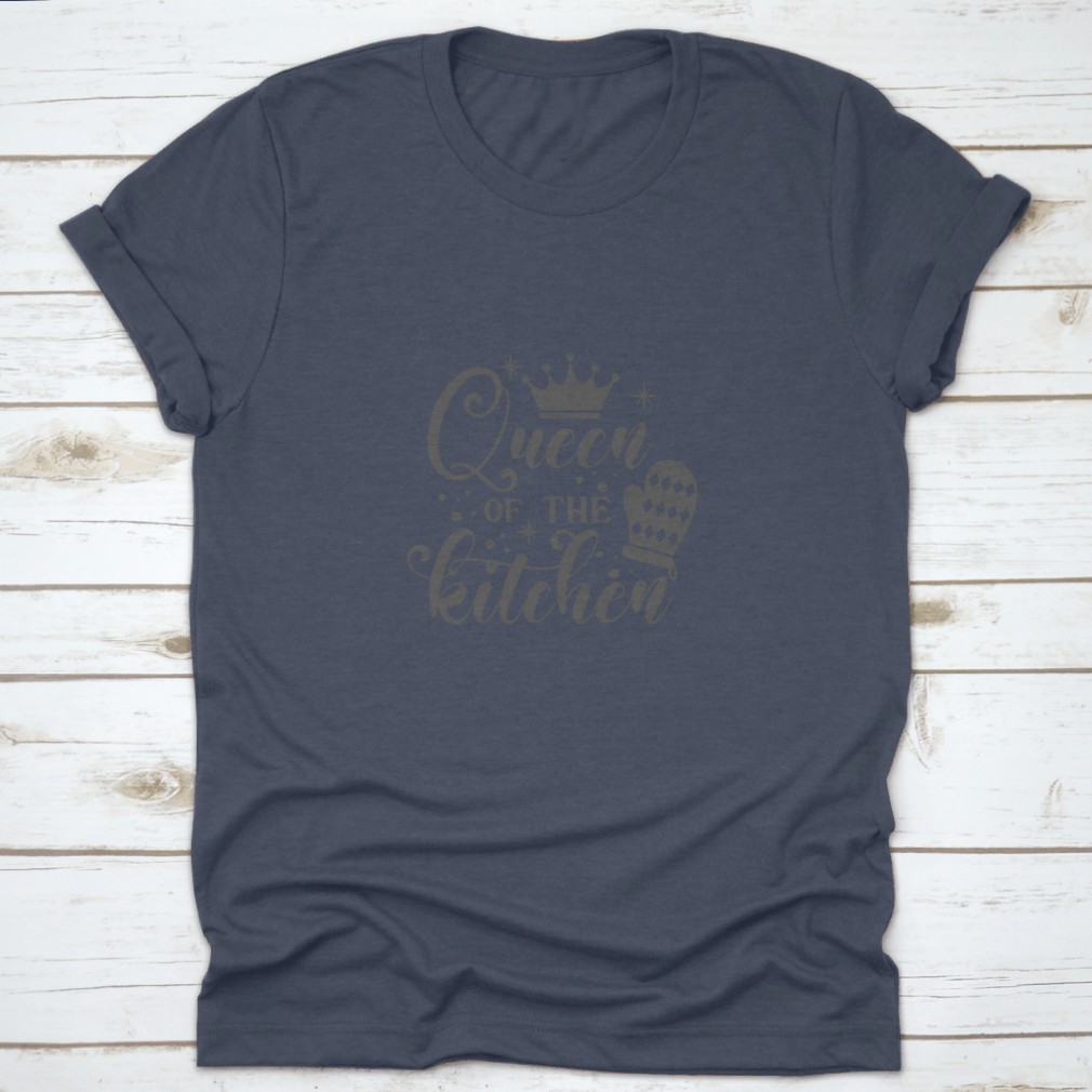A stylish cotton t-shirt featuring the slogan 'Queen Of The Kitchen' in a fun vector design, perfect for cooking enthusiasts.