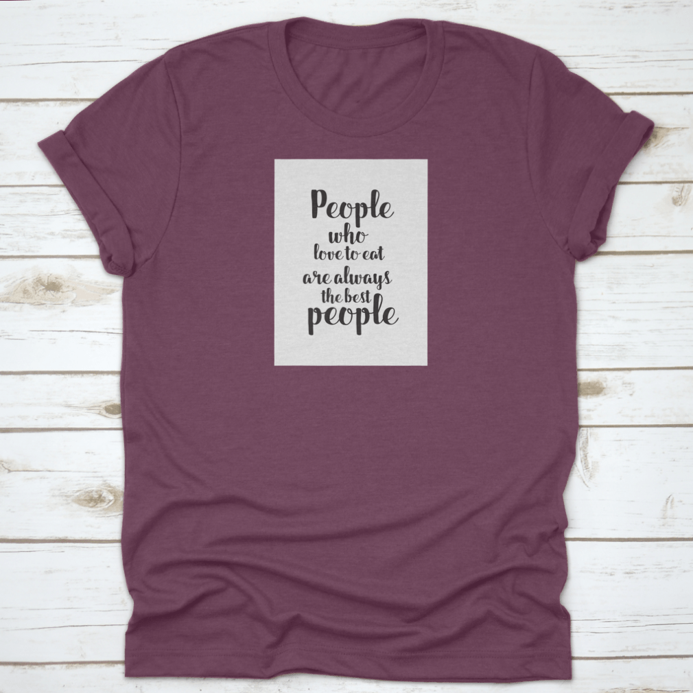 A stylish cotton t-shirt featuring a unique hand lettering design with food quotes, perfect for culinary enthusiasts.