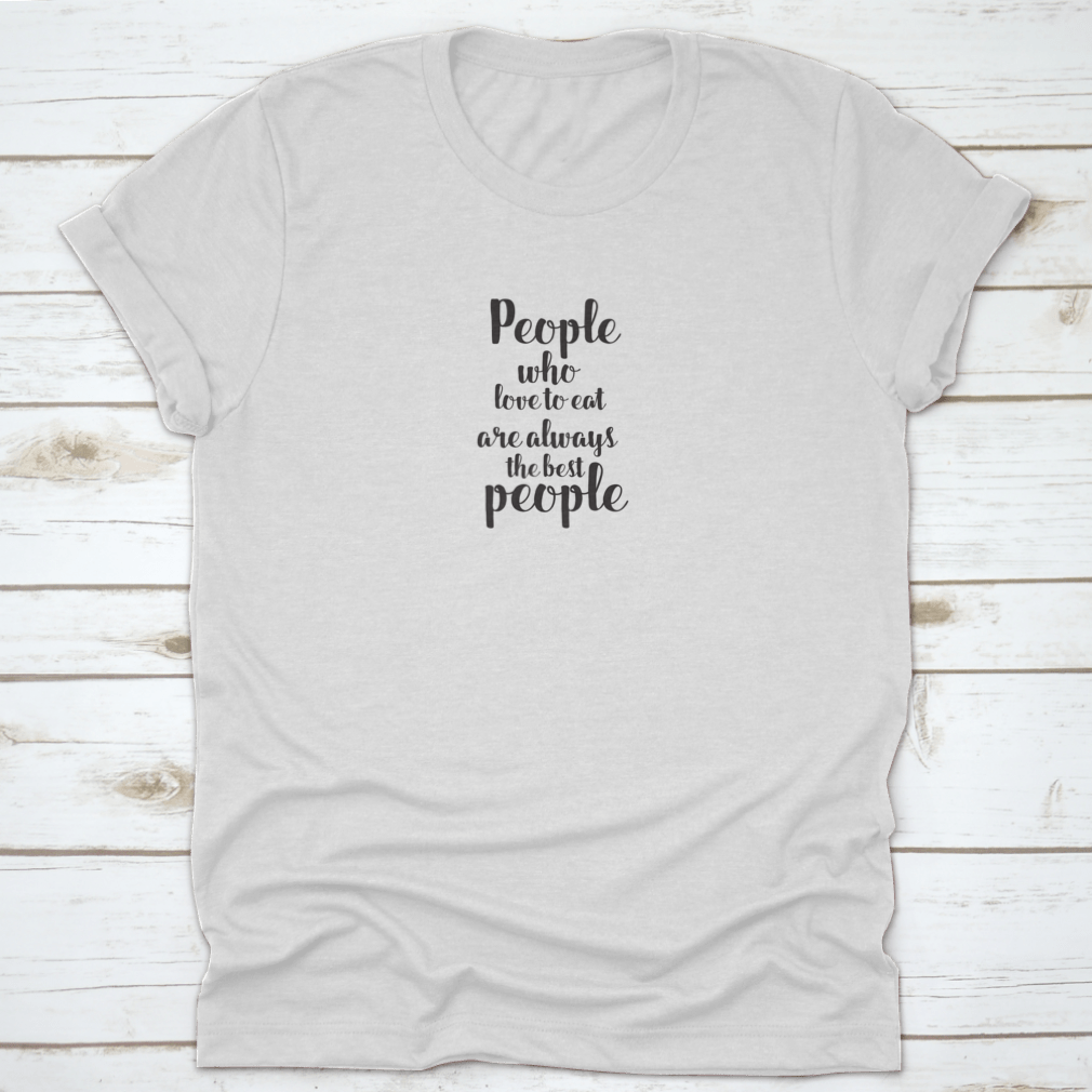 A stylish cotton t-shirt featuring a unique hand lettering design with food quotes, perfect for culinary enthusiasts.