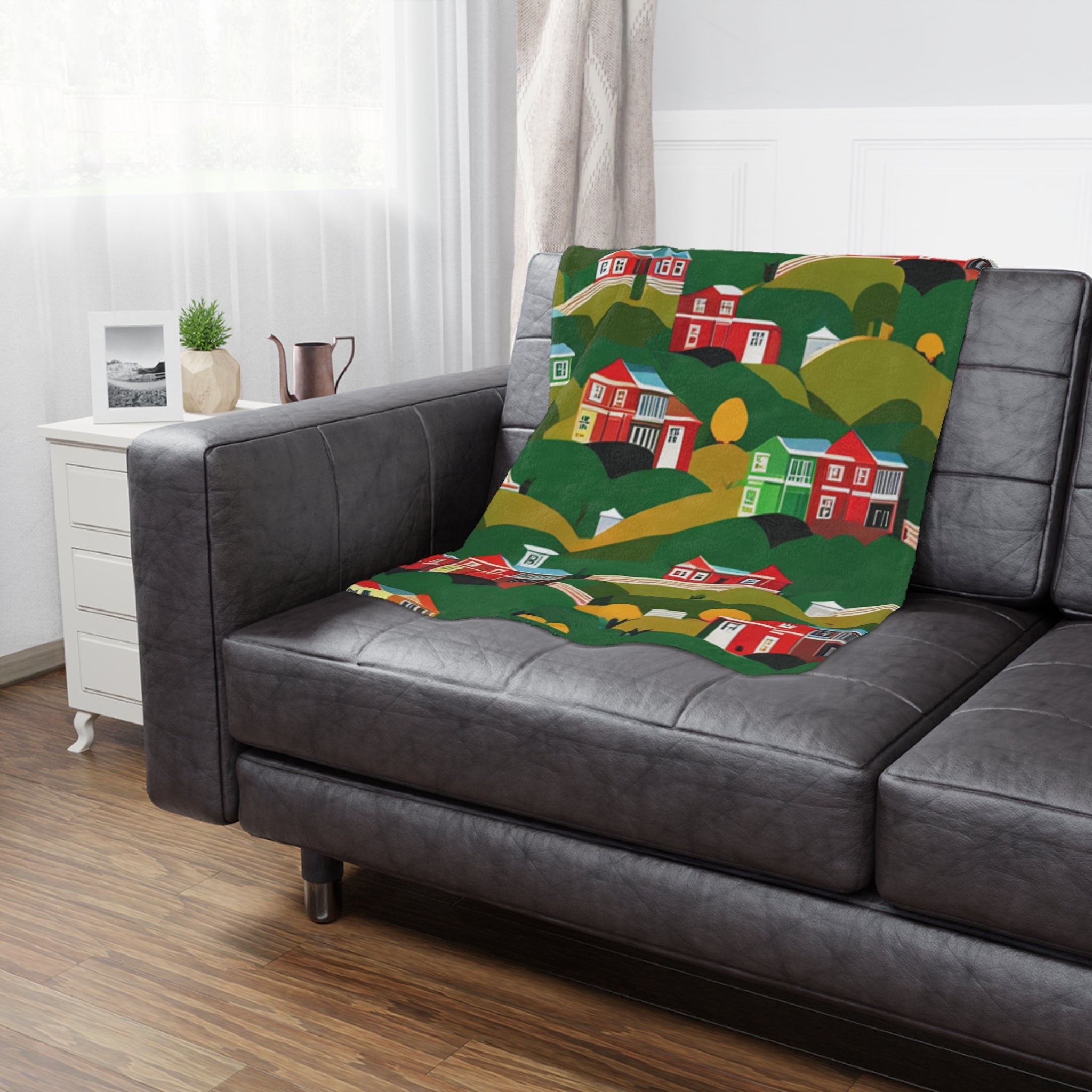 A cozy Red and Orange Houses Minky Blanket featuring a vibrant house print, made from ultra-soft micro-fleece material.