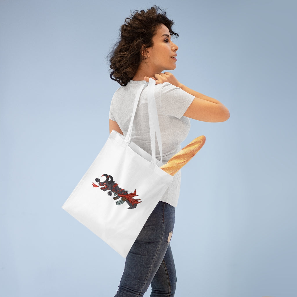 Red Black Dragon Gun Tote Bag featuring vibrant colors and cross-stitched handles, made from durable 100% cotton fabric.