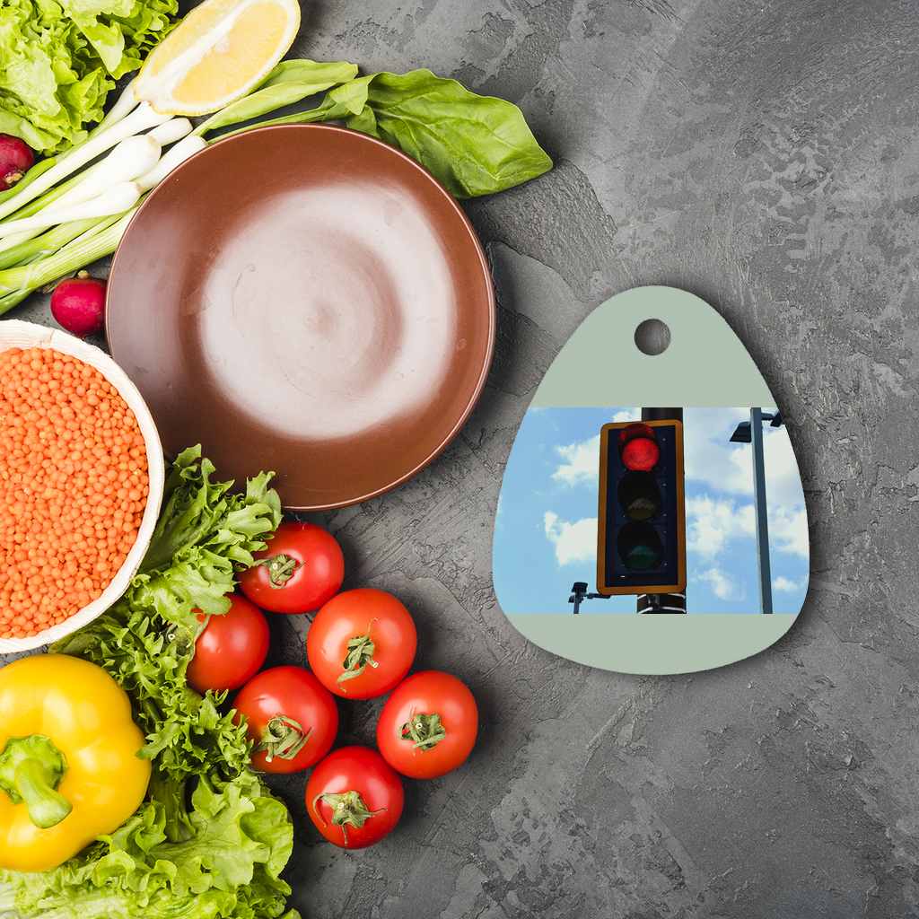 Red Light Sublimation Glass Cutting Board with a round shape, featuring a toughened glass surface ideal for custom designs and logos.