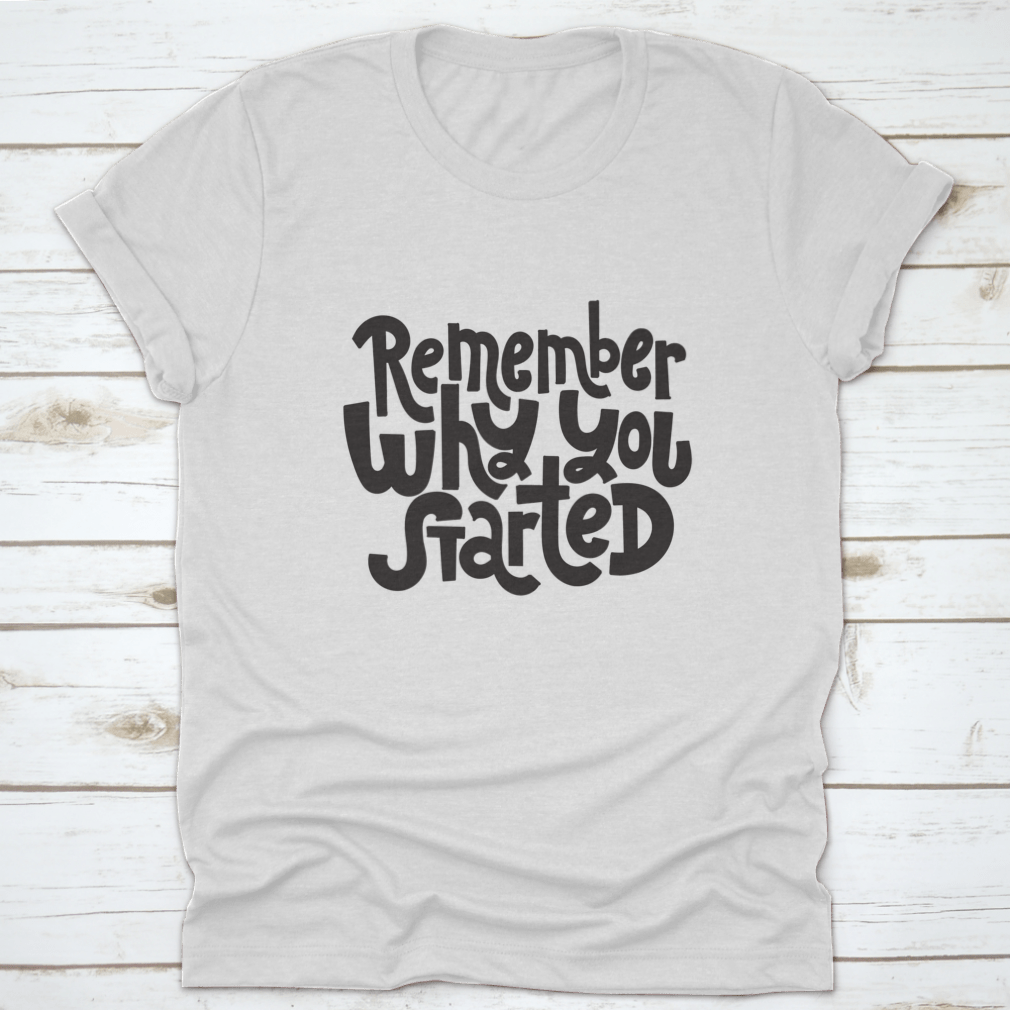 A comfortable and stylish t-shirt featuring the motivational quote 'Remember Why You Started', made from 100% cotton with a classic fit.