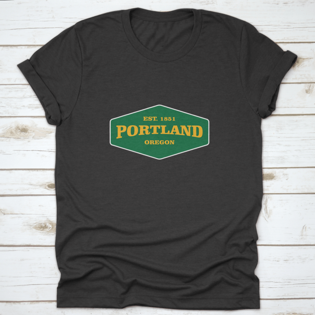 Retro Badge Portland T-shirt featuring a unique graphic design, made from 100% cotton for comfort and durability.