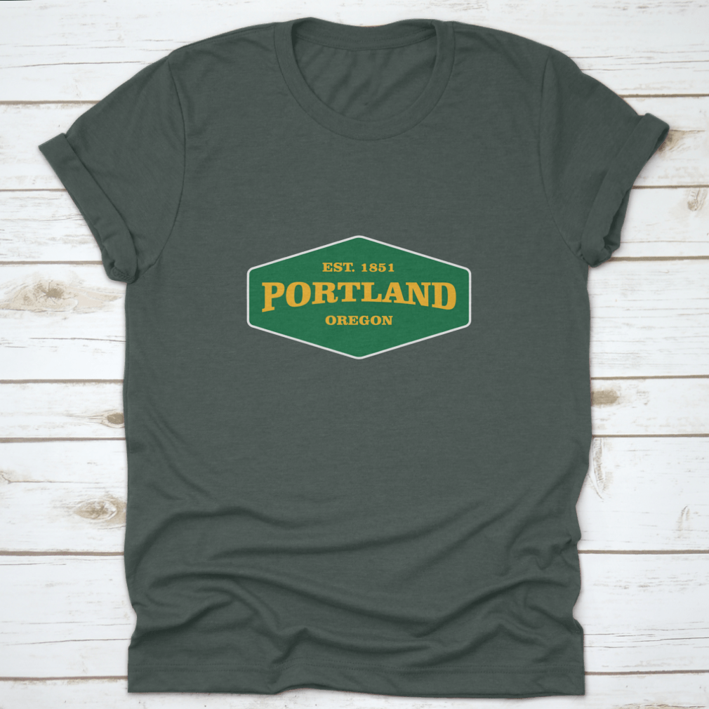 Retro Badge Portland T-shirt featuring a unique graphic design, made from 100% cotton for comfort and durability.
