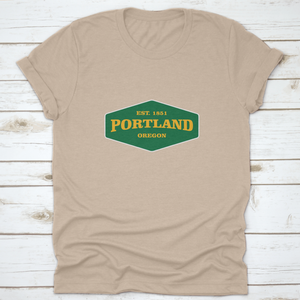 Retro Badge Portland T-shirt featuring a unique graphic design, made from 100% cotton for comfort and durability.