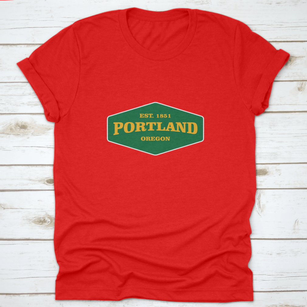 Retro Badge Portland T-shirt featuring a unique graphic design, made from 100% cotton for comfort and durability.