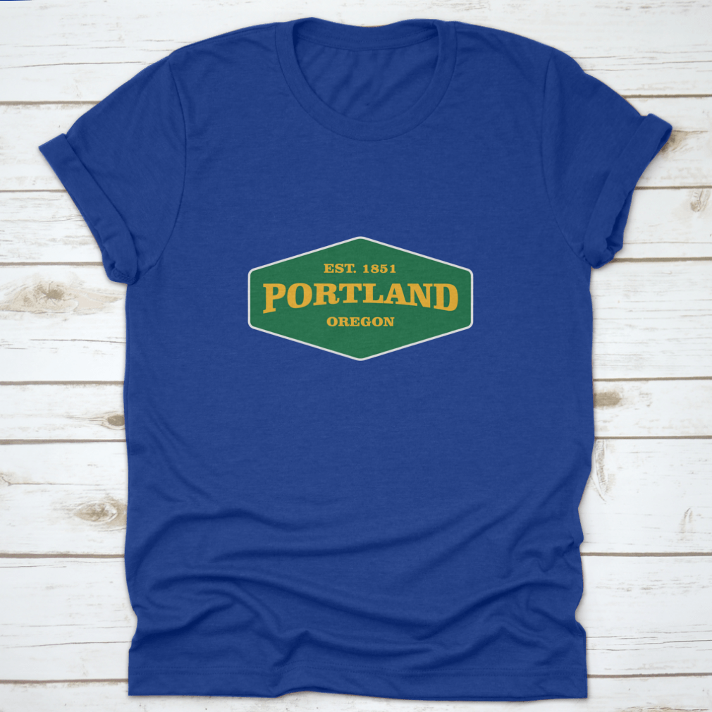 Retro Badge Portland T-shirt featuring a unique graphic design, made from 100% cotton for comfort and durability.