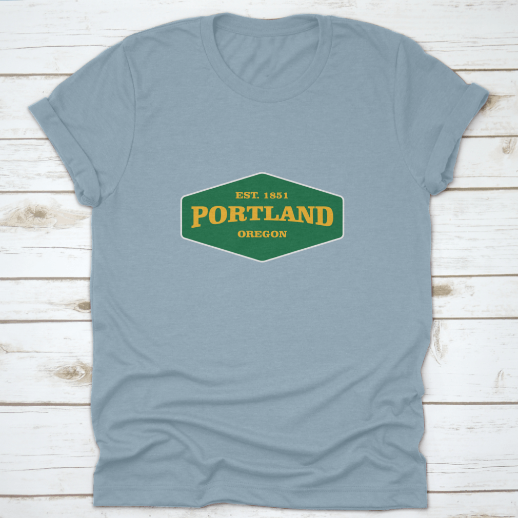 Retro Badge Portland T-shirt featuring a unique graphic design, made from 100% cotton for comfort and durability.