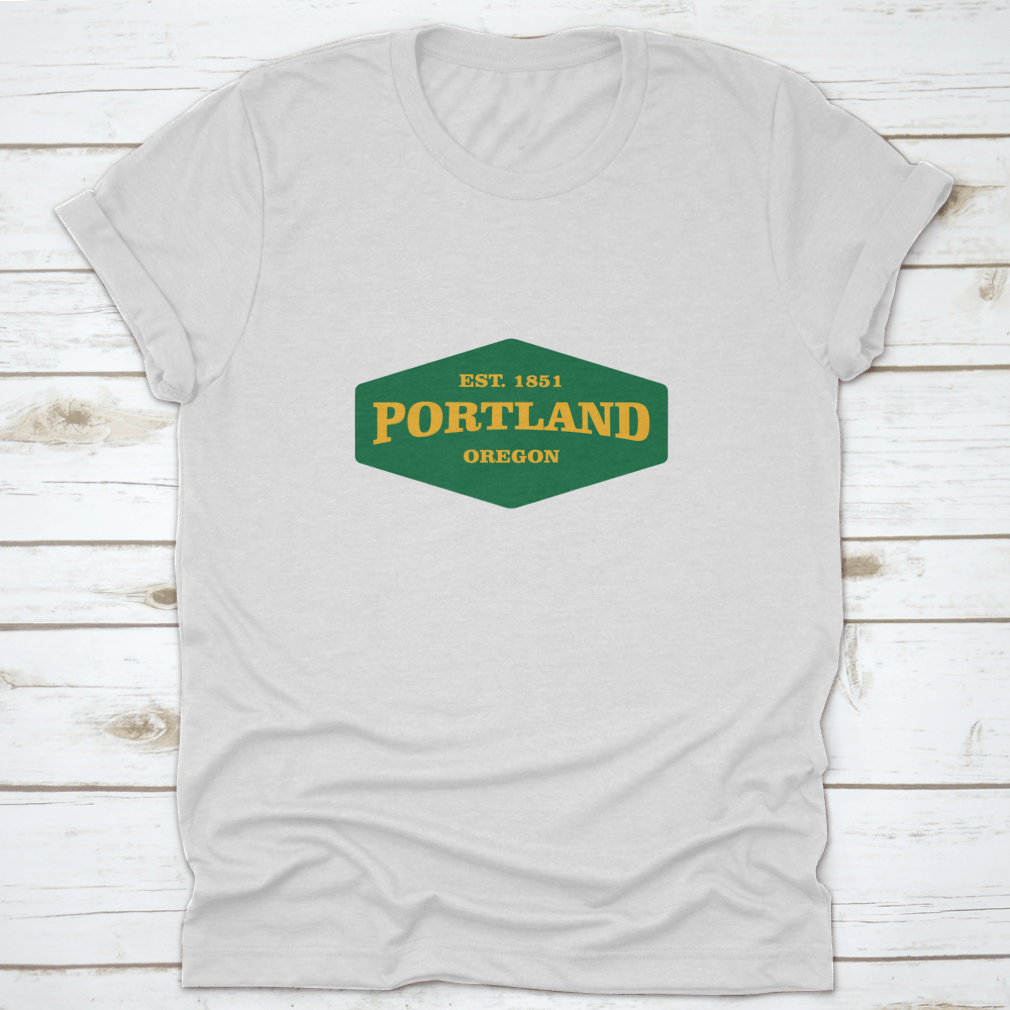 Retro Badge Portland T-shirt featuring a unique graphic design, made from 100% cotton for comfort and durability.