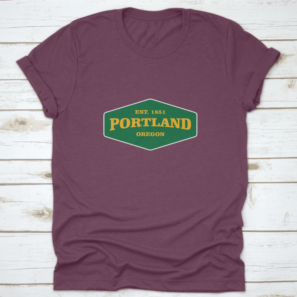 Retro Badge Portland T-shirt featuring a unique graphic design, made from 100% cotton for comfort and durability.