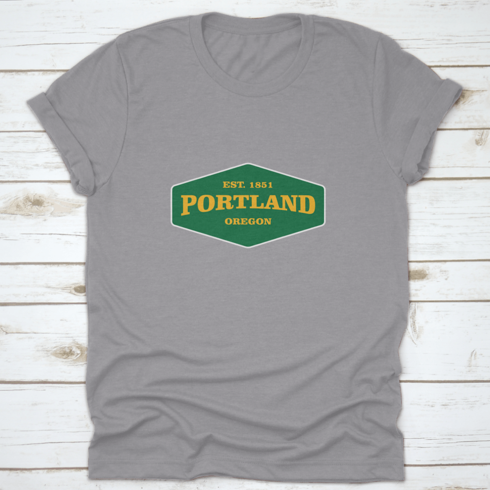 Retro Badge Portland T-shirt featuring a unique graphic design, made from 100% cotton for comfort and durability.