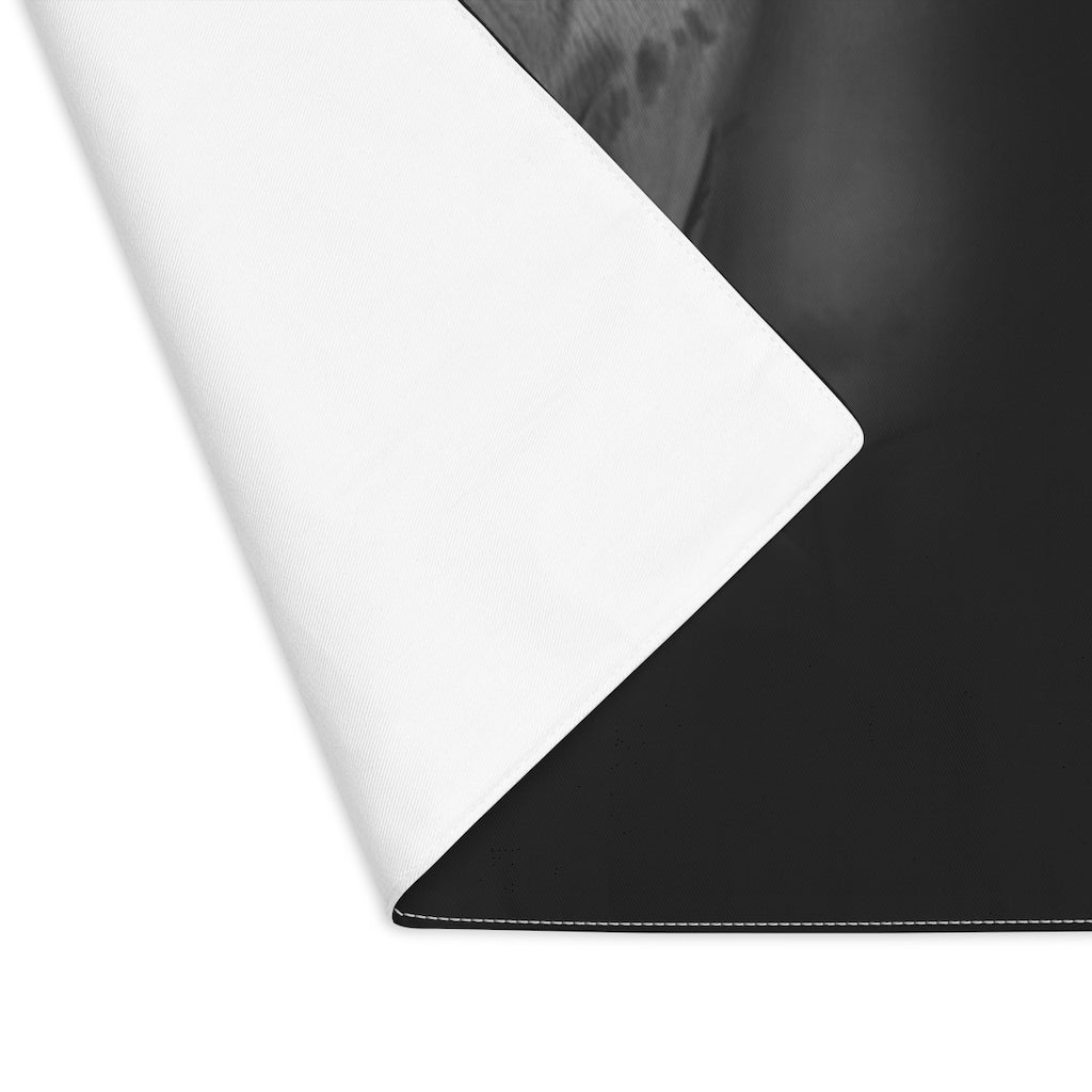 Rhino Placemat featuring a unique rhino print on one side and a natural cotton back, perfect for enhancing dining experiences.