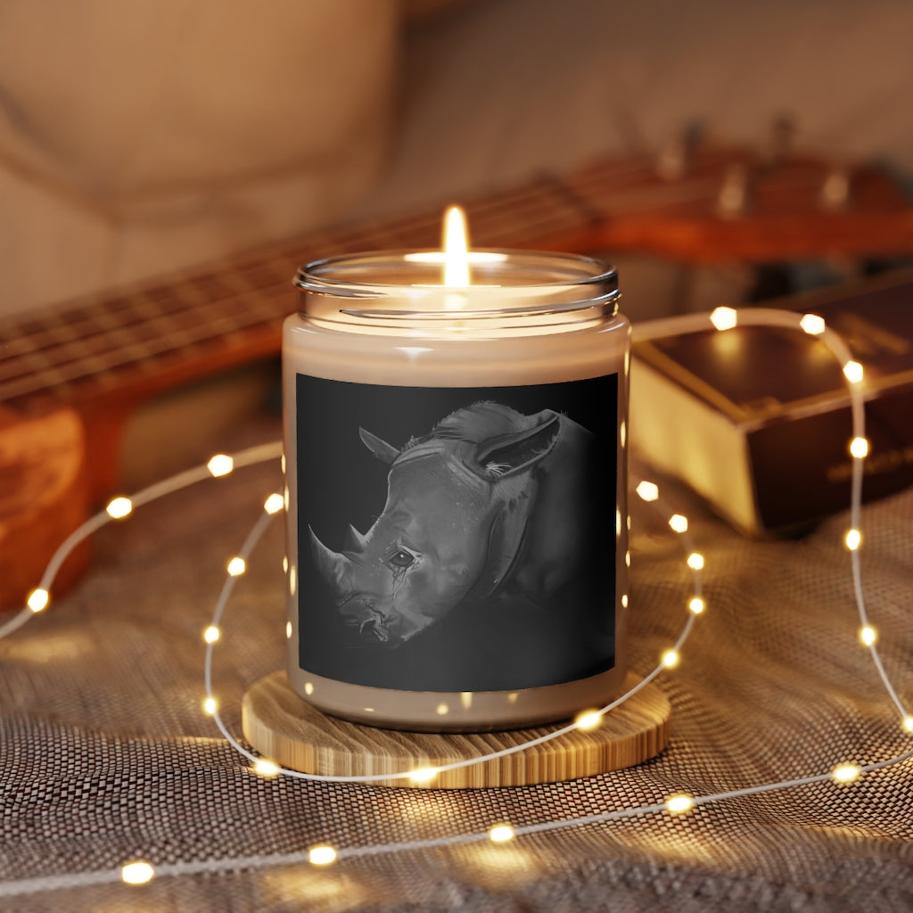 Rhino Scented Candle in a glass container, featuring a permanent label, showcasing its soothing Cinnamon Stick and Vanilla fragrances.