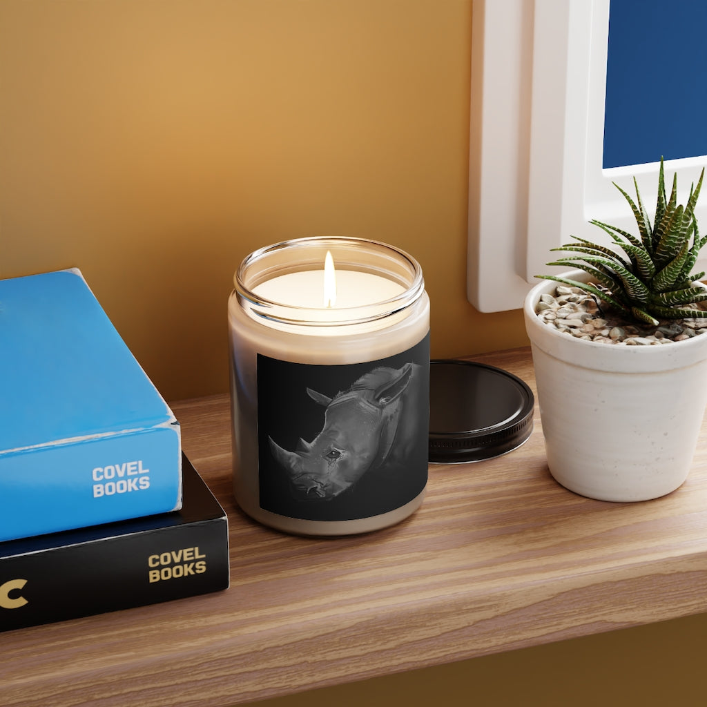 Rhino Scented Candle in a glass container, featuring a permanent label, showcasing its soothing Cinnamon Stick and Vanilla fragrances.