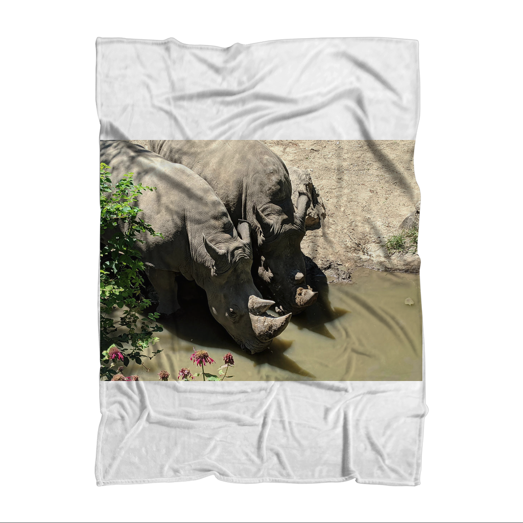 Rhino Sublimation Throw Blanket made of 100% polyester polar fleece, featuring vibrant sublimation prints and a white back.