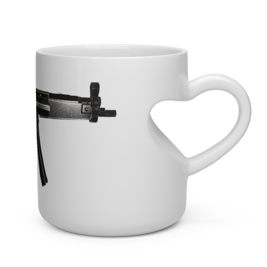 A white ceramic heart-shaped mug with a heart-shaped handle, perfect for hot beverages.