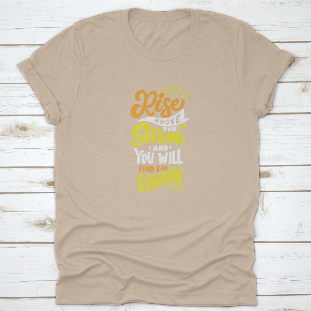 A comfortable cotton t-shirt featuring the inspiring quote 'Rise Above The Storm And You Will Find The Sunshine' in a stylish design.
