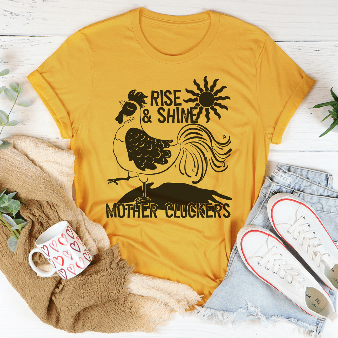 Rise & Shine Mother Cluckers T-Shirt in soft cotton with double stitching, featuring a playful design.