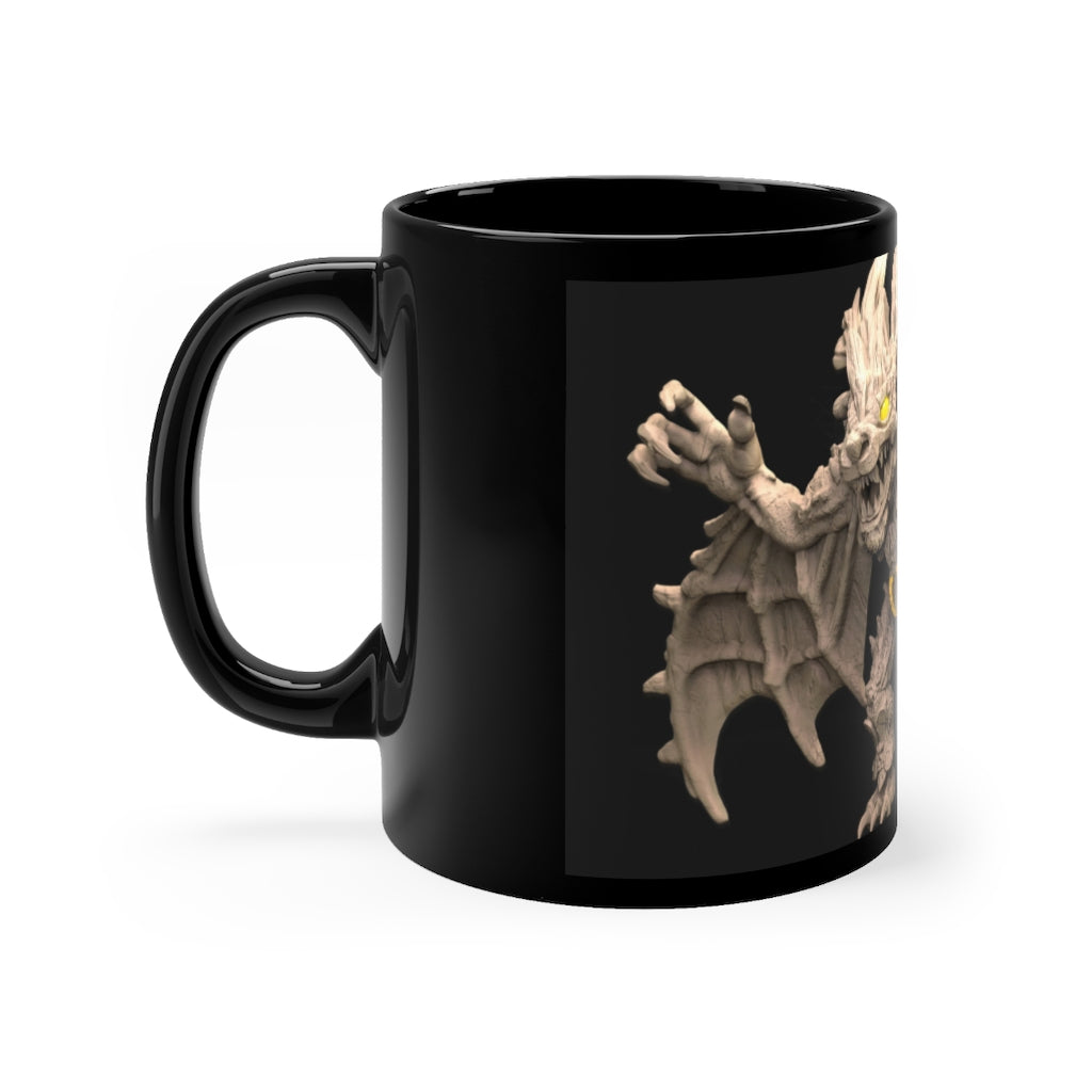 Rock Creature Black mug, 11oz capacity, featuring a sleek black ceramic design with rounded corners and a comfortable C-handle.