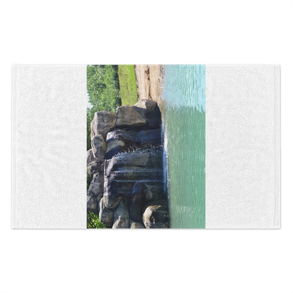 Rock Waterfall Rally Towel measuring 11x18 inches, featuring a soft printed mink polyester front and absorbent cotton loop backing.