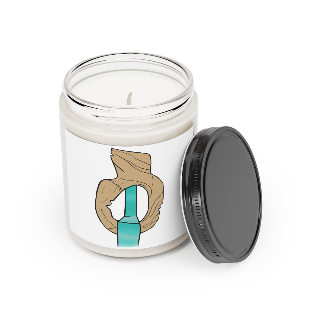 Rock with Water Scented Candle in a glass container, featuring a permanent adhesive label, showcasing its soothing aroma options.