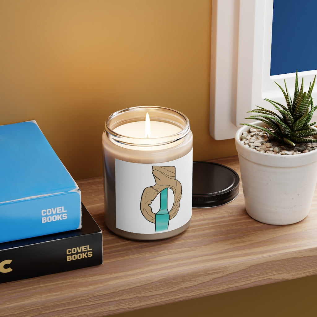 Rock with Water Scented Candle in a glass container, featuring a permanent adhesive label, showcasing its soothing aroma options.