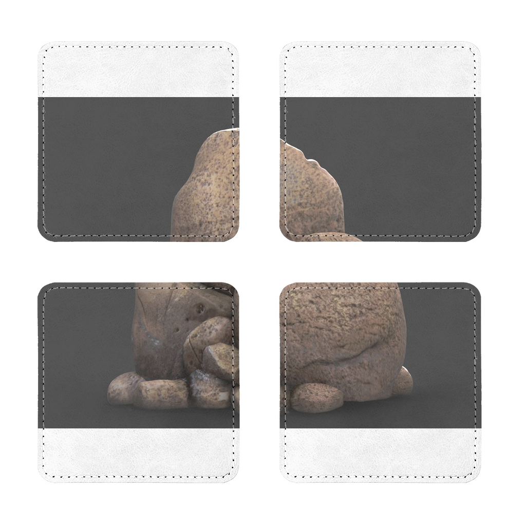 A pack of four Rocks Sublimation Coasters made of PU leather, featuring a white printable face and white stitching, displayed on a wooden table.