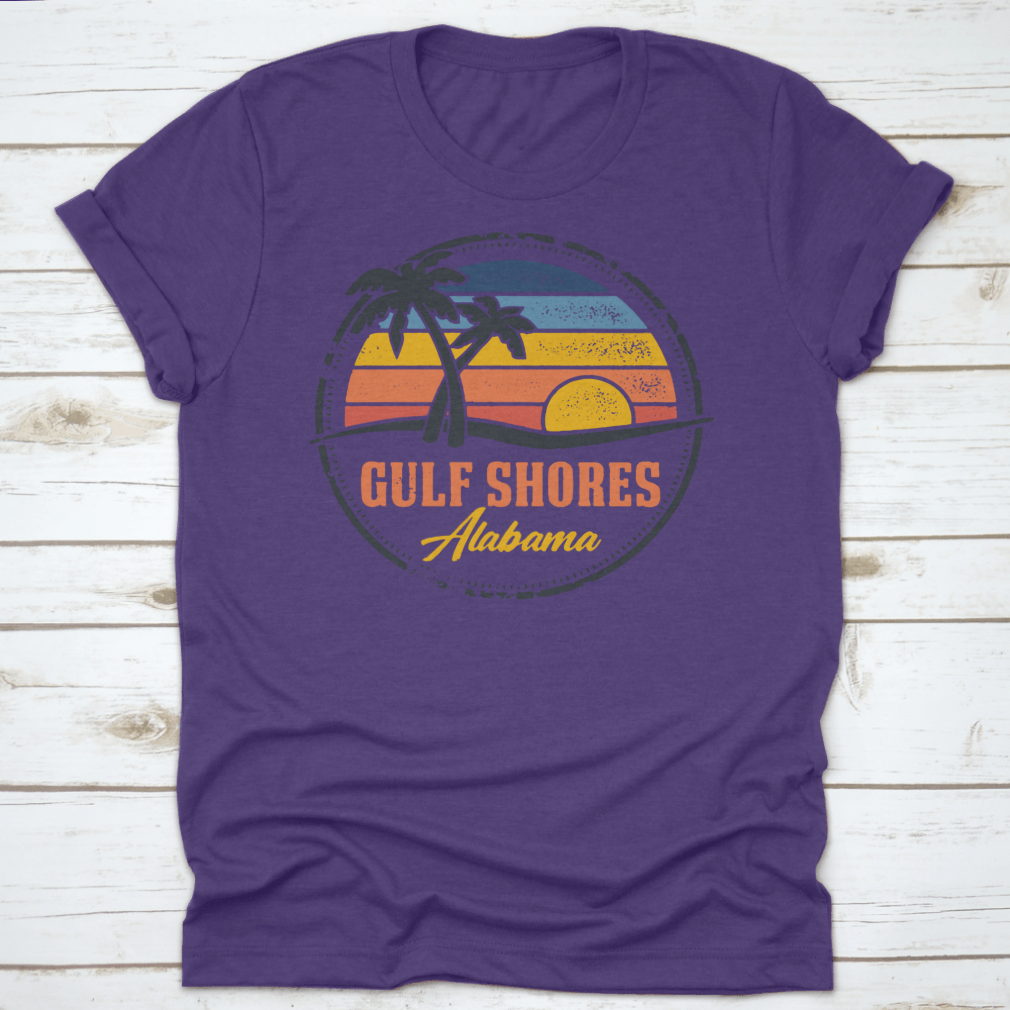 Round logo illustration featuring Gulf Shores, Alabama beach with a vibrant sunset line, showcasing the beauty of coastal living.