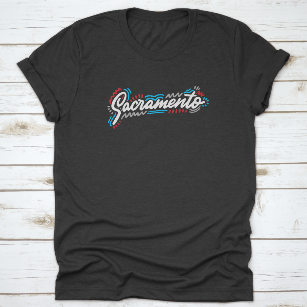 Sacramento Handwritten City Name design on a stylish cotton garment, showcasing modern calligraphy.
