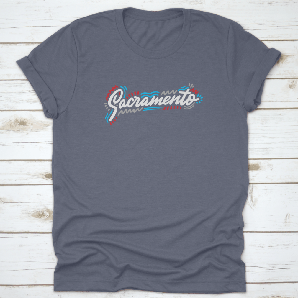 Sacramento Handwritten City Name design on a stylish cotton garment, showcasing modern calligraphy.