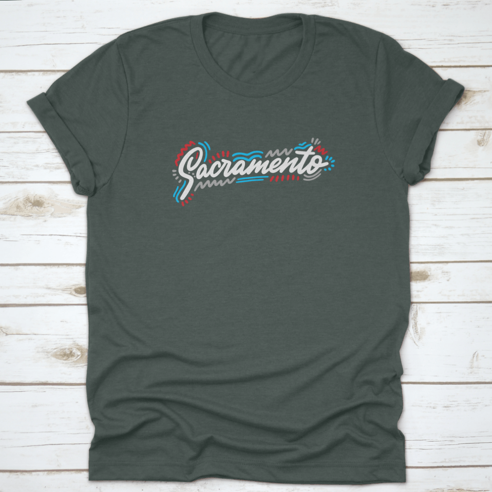 Sacramento Handwritten City Name design on a stylish cotton garment, showcasing modern calligraphy.