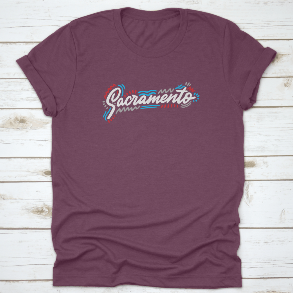 Sacramento Handwritten City Name design on a stylish cotton garment, showcasing modern calligraphy.
