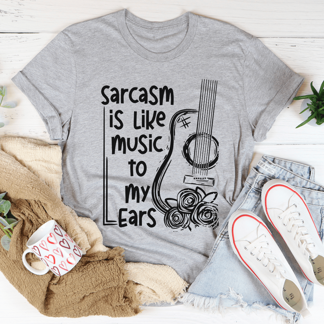 A comfortable Sarcasm Is Like Music To My Ears T-Shirt made from soft cotton, featuring a humorous print.