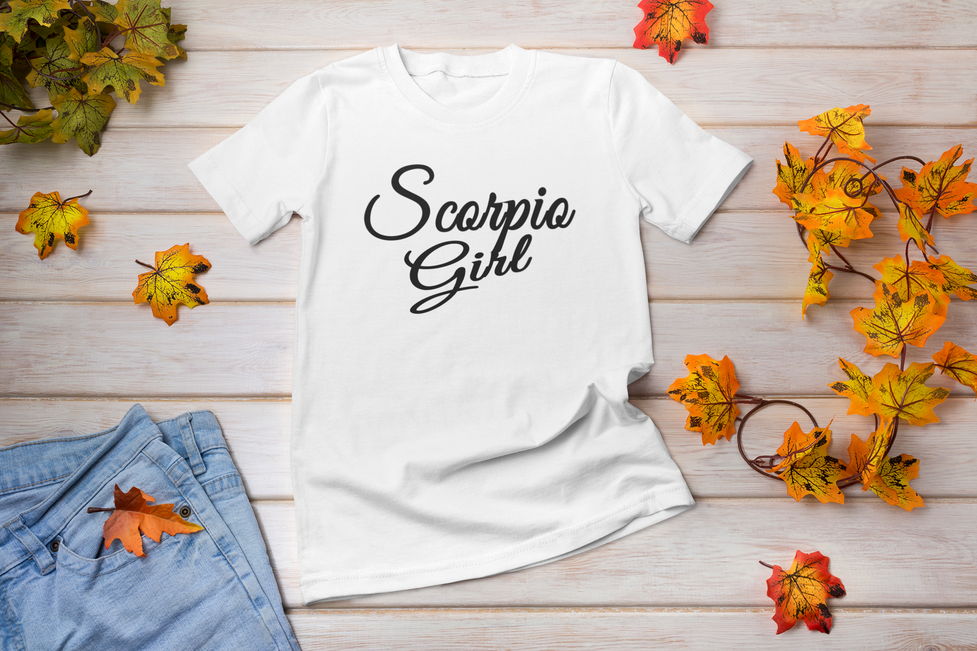 A stylish unisex Scorpio Girl Lettering T-shirt featuring bold zodiac-themed design in a comfortable fit.