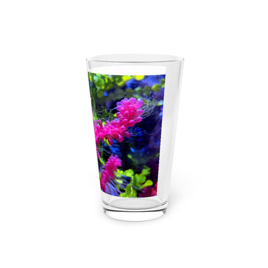 A clear 16oz Seahorse Pint Glass showcasing a unique design, perfect for beverages.