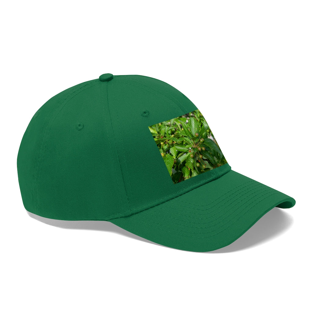 Seeds and Green Leaves Unisex Twill Hat showcasing a classic 6-panel design in durable cotton twill, featuring an adjustable Velcro closure.