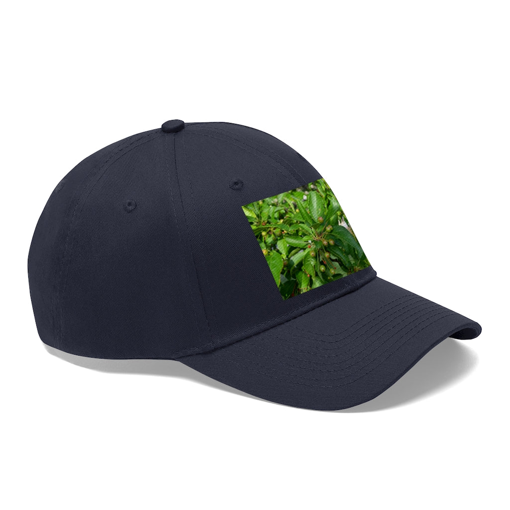 Seeds and Green Leaves Unisex Twill Hat showcasing a classic 6-panel design in durable cotton twill, featuring an adjustable Velcro closure.