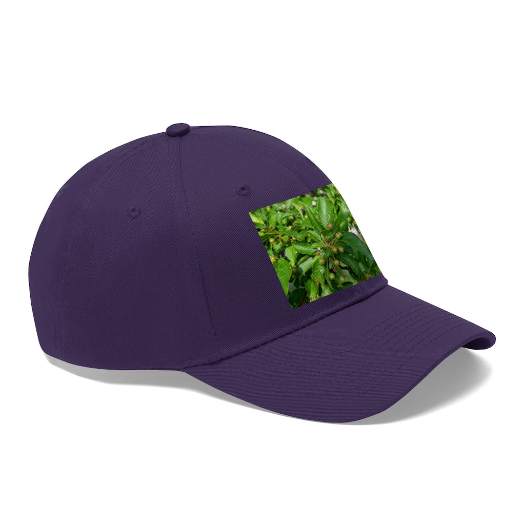 Seeds and Green Leaves Unisex Twill Hat showcasing a classic 6-panel design in durable cotton twill, featuring an adjustable Velcro closure.